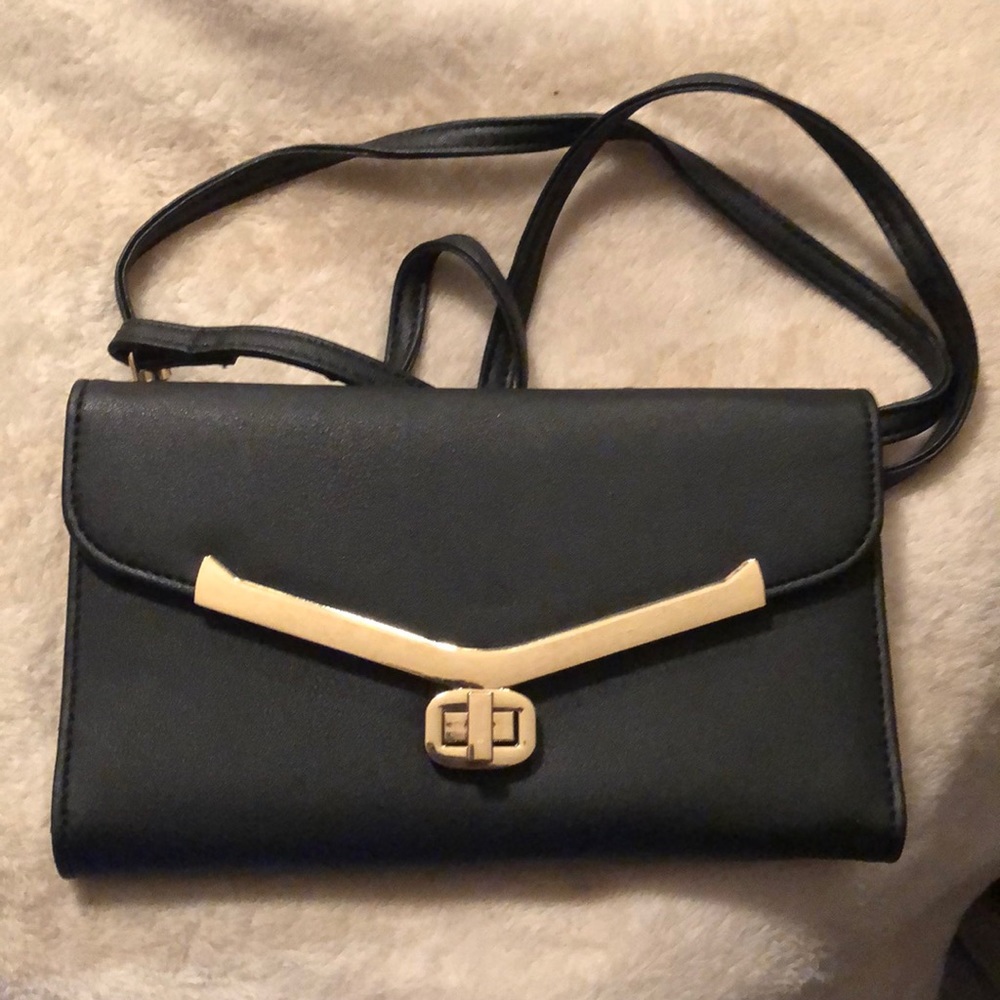 Jacqueline Smith black and gold clutch wallet